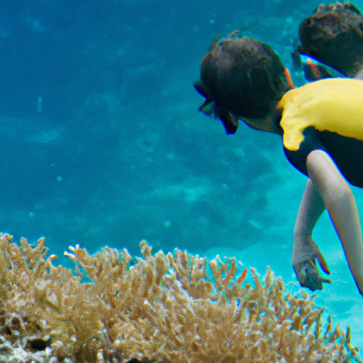 5. Children exploring a coral reef while snorkeling